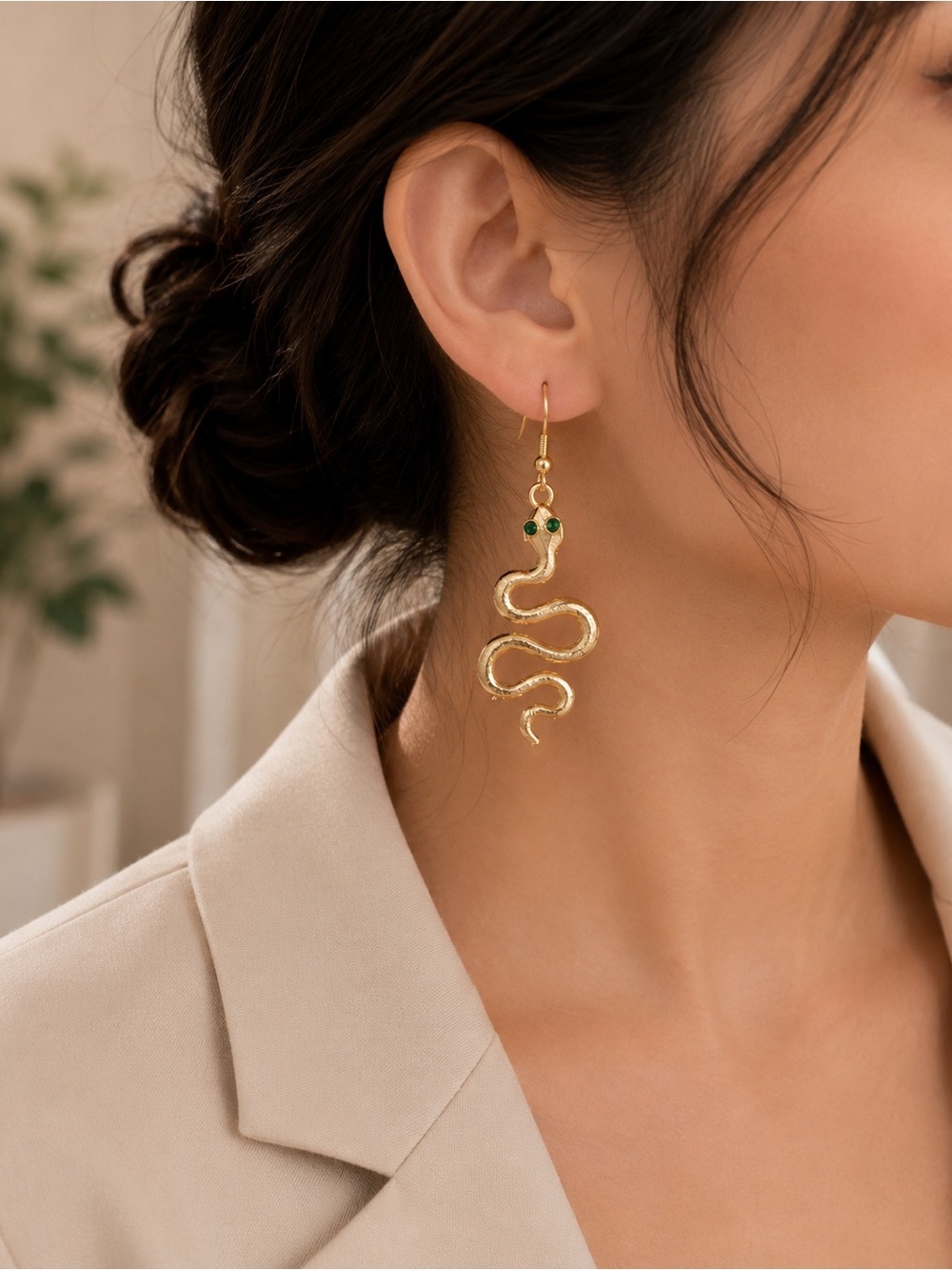 Gold Snake Drop Earrings with Green Accents